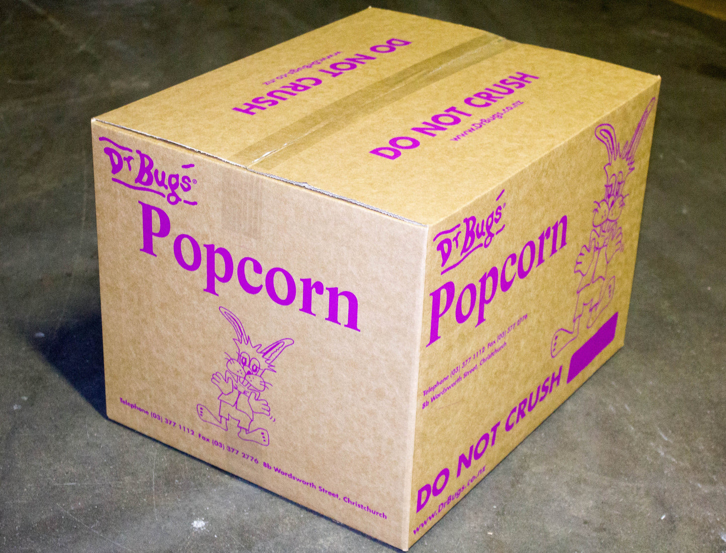 Bulk carton of Dr Bugs buttered popcorn for movie nights and fairs